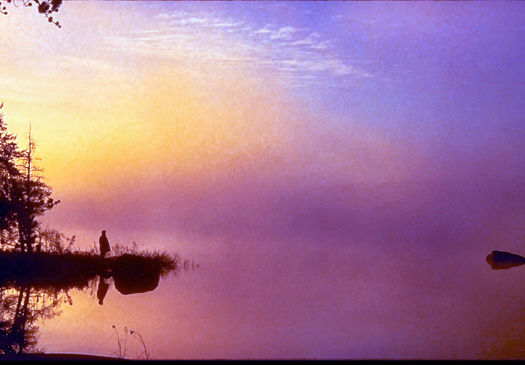 Serenity. Man on a Lake.