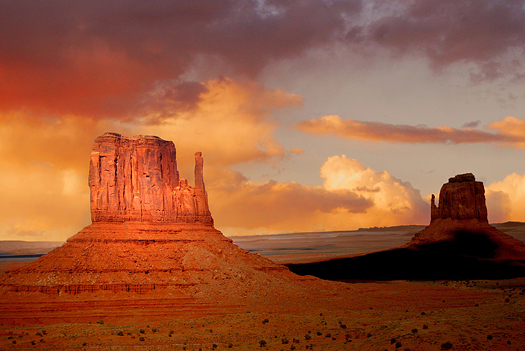 Twin peaks of rock formations in the Navajo Park of Monument Valley Utah