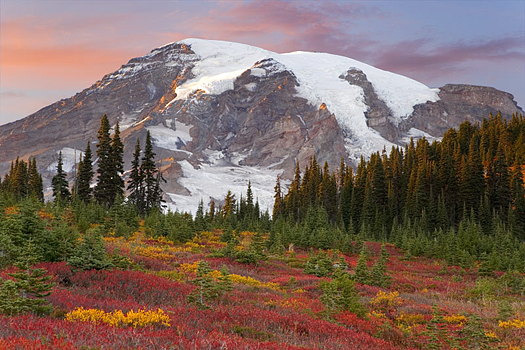 Snowy mountains with forefront of Fall colors