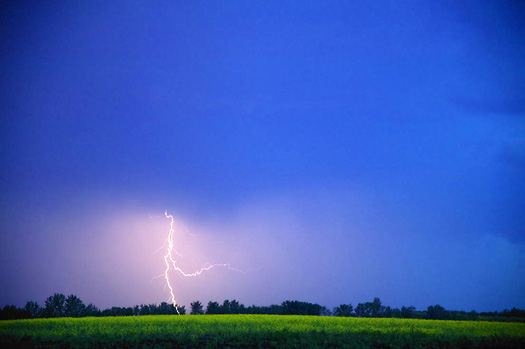 Lightning over a farm field