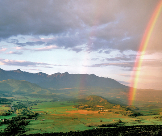 Rainbow Over Dallas Divide, Colorado by Robert Castellino