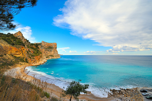 view of a gorgeous mediterranean coast beach in summertime