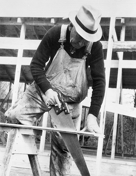 Carpenter at the Berwyn project, Maryland by Carl Mydans [Library of Congress LC-USF344-002273-ZB]